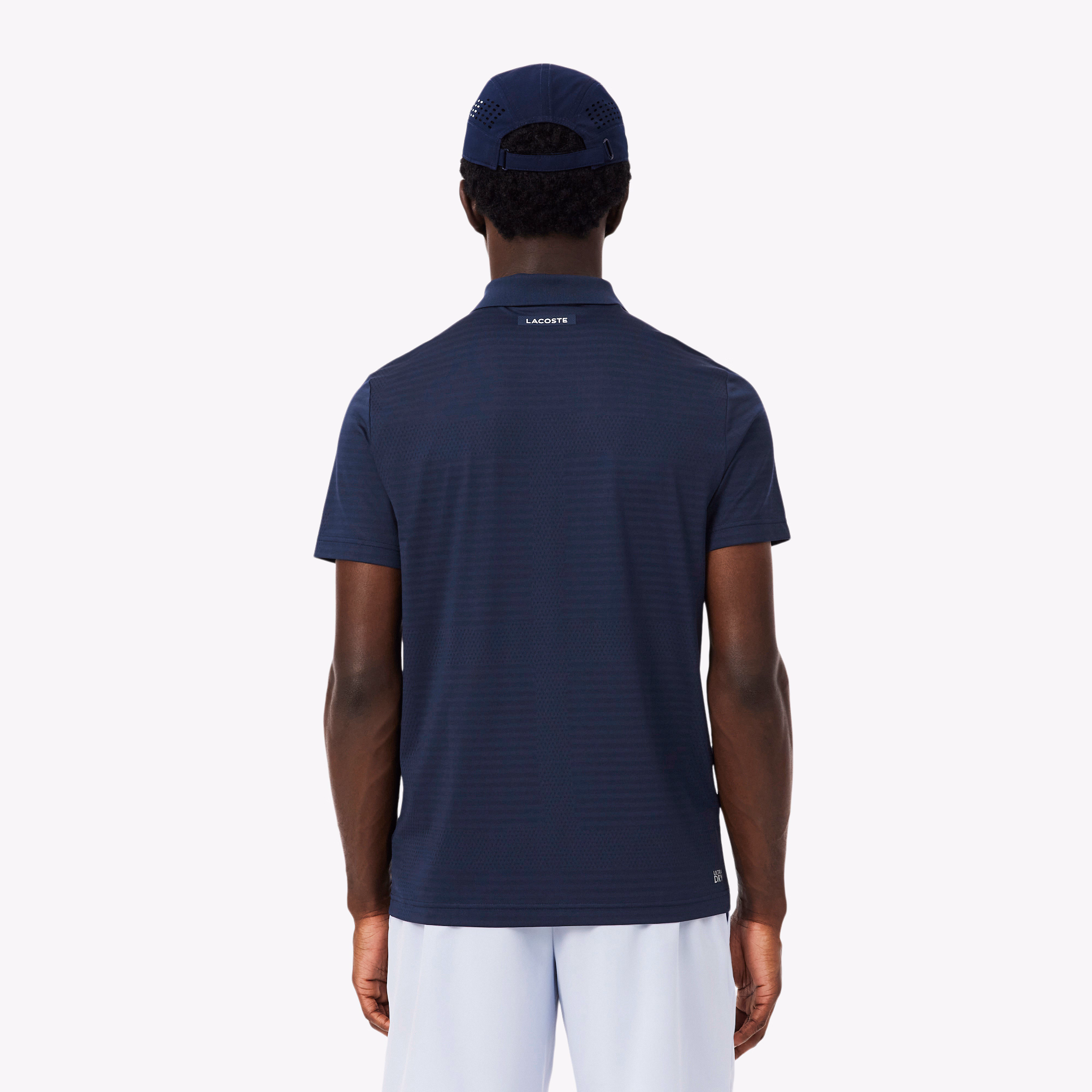 Polo tennis en jersey alvéolé ultra dry - LACOSTE